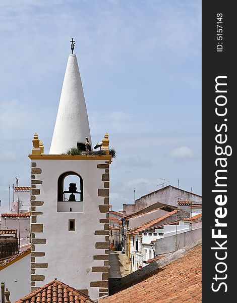 Storks in top of one church roof in Montalvao - Portugal. Storks in top of one church roof in Montalvao - Portugal