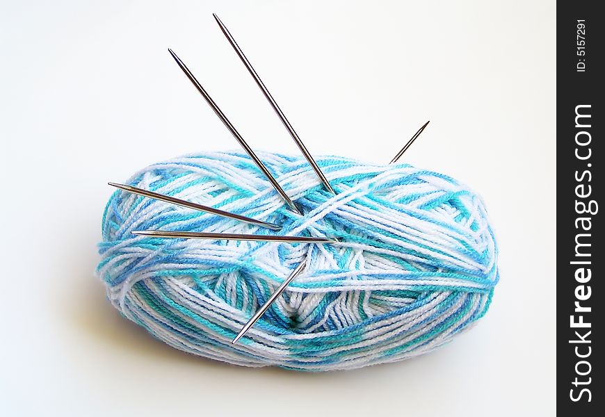 Clew And Knitting Needles