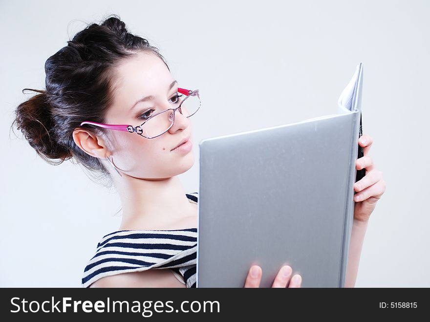 Beauty business woman in glasses at white background