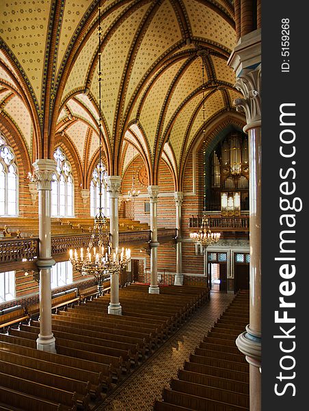 Inside of a church with a view of its pipe organ (Lund, Sweden)