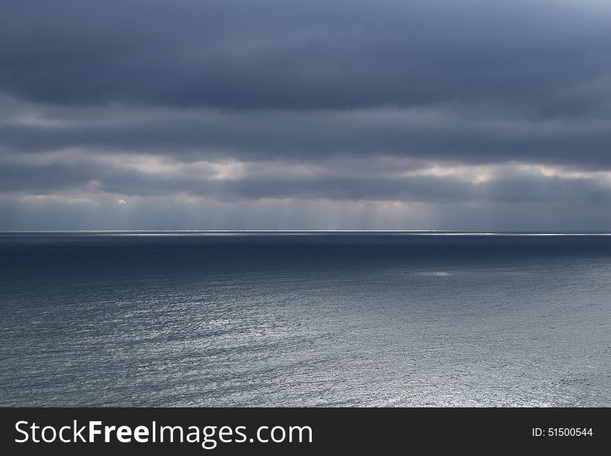 Black Sea, clouds, sun Ray on the surface of the sea