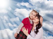 Young Mother And Her Little Daughter Look Up Royalty Free Stock Image