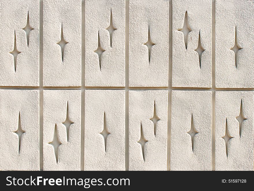 Concrete wall with patterns as background