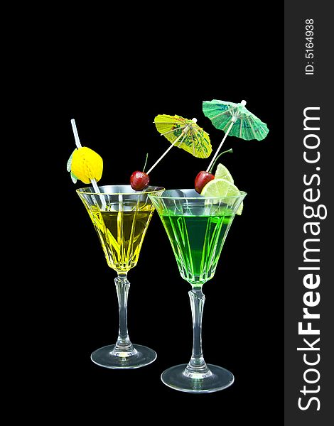 Two cocktails isolated on black background. Two cocktails isolated on black background