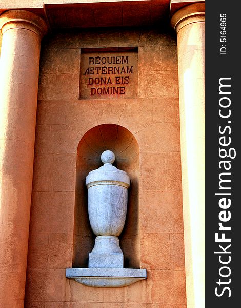 Cemetery entrance front façade, wuth sculpted cirerary vases. Christianity, religiorn and death. 
Island of Sicily - Italy. Cemetery entrance front façade, wuth sculpted cirerary vases. Christianity, religiorn and death. 
Island of Sicily - Italy