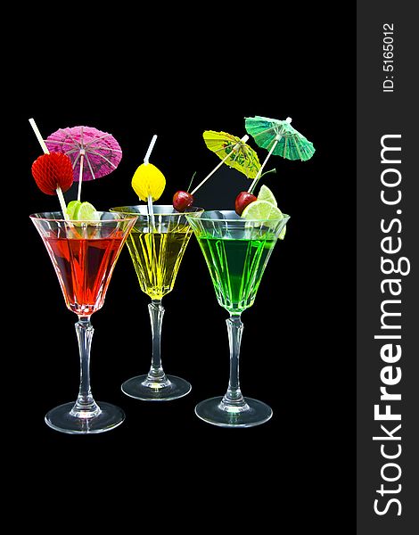 Three cocktails isolated on black background. Three cocktails isolated on black background