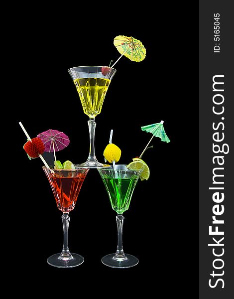 Three  stacked cocktails isolated on black background. Three  stacked cocktails isolated on black background