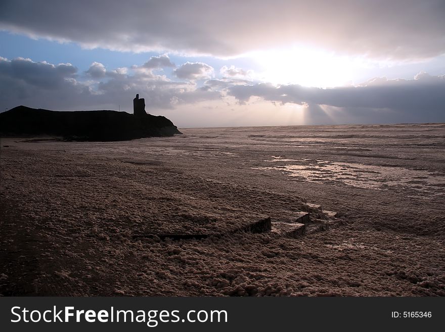 A castle in a west of ireland storm on its cliffs in ballybunion. A castle in a west of ireland storm on its cliffs in ballybunion