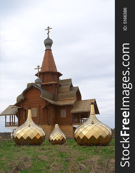 Three golden dome on the ground with green grass. Three golden dome on the ground with green grass