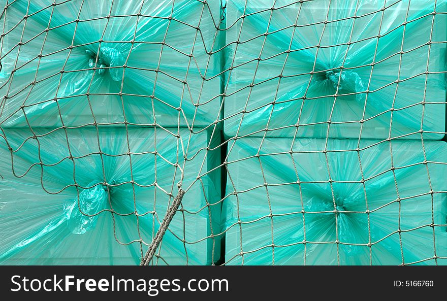 Turquoise plastic abstract on a Japanese fishing boat