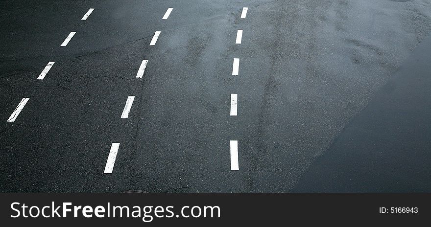 Traffic lines on asphalt