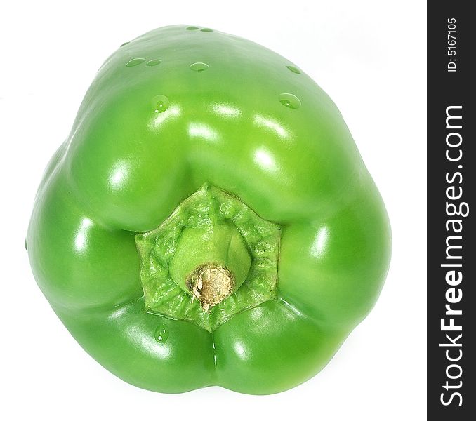 Isolated big nice green paprika with water drops against white. Isolated big nice green paprika with water drops against white