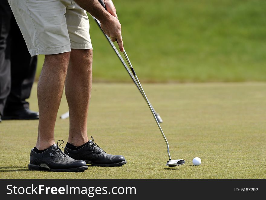 Putter, Golf Ball and Feet