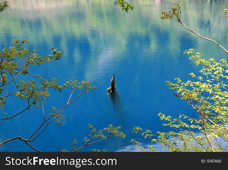 Blue lake in jiuzhaigou valley scene，sichuan province