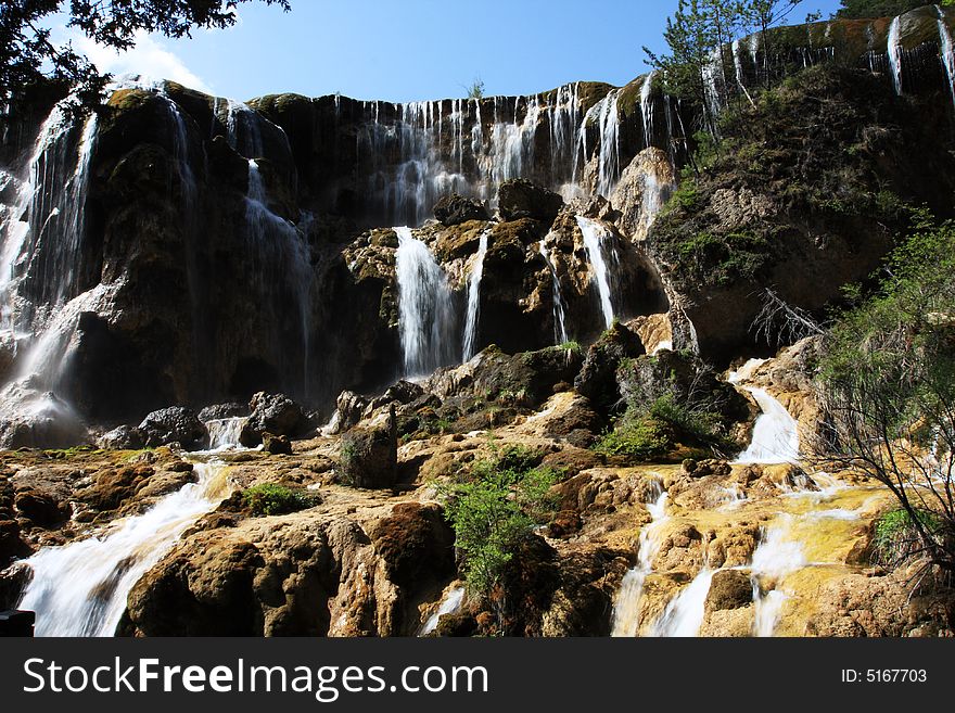 Beautiful waterfall in jiuzhaigou valley secnicï¼Œwhitch was listed into the World Natural Heritage Catalog in 1992