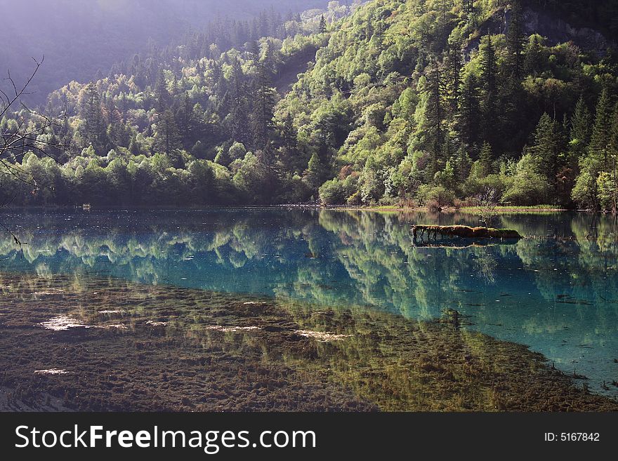 Peacock  lake in jiuzhaigou valley scene，sichuan province. Peacock  lake in jiuzhaigou valley scene，sichuan province