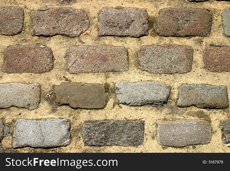 Close up abstract photo of cobbles in a street in Eton, England