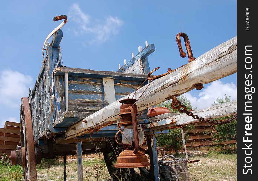 Old wooden carriage reminding far west times. Old wooden carriage reminding far west times