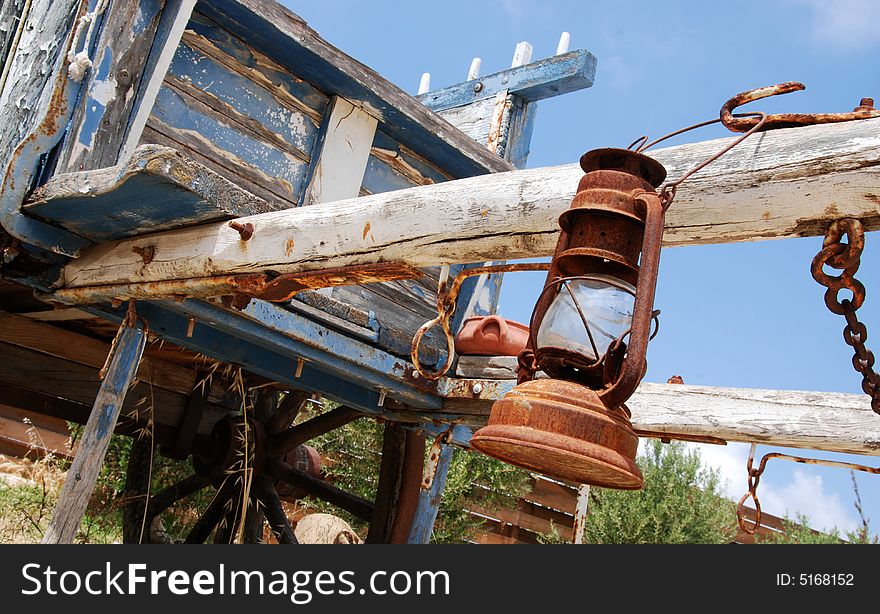 Old wooden carriage reminding far west times. Old wooden carriage reminding far west times