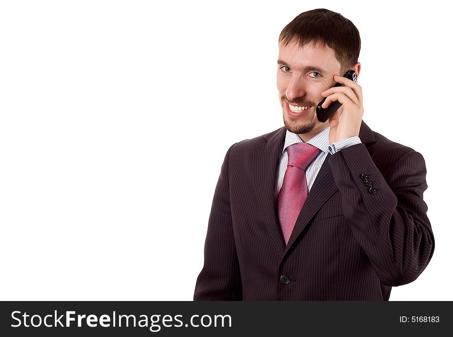 Young modern business man talking on cell phone (isolated on white)