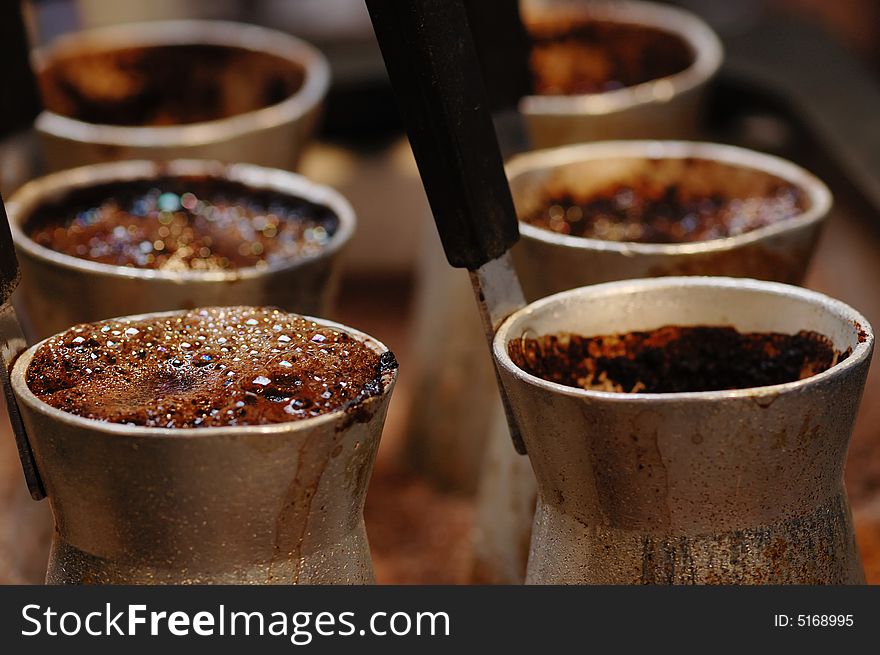 Hot turkish coffee in the jezve. Hot turkish coffee in the jezve.