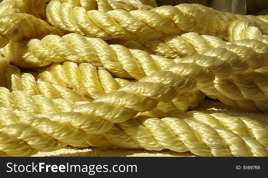 Yellow strong textured rope close-up