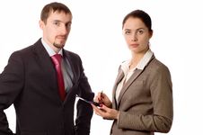 Young Business Man And Woman Working On A Pda Royalty Free Stock Image Young Business Man And Woman Working On A Pda Royalty Free Stock Image