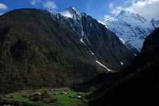 Village Under Snow Mountain Stock Photo Village Under Snow Mountain Stock Photo