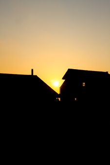 Sunset Silhouette Of House Stock Images