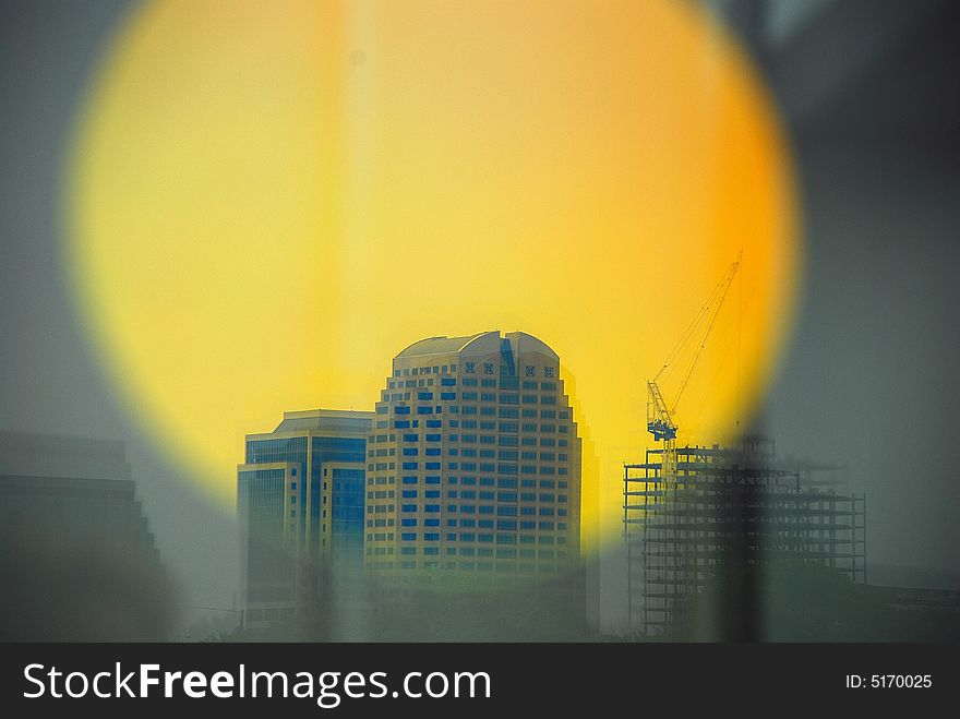 Reflection of Downtown Sacramento thru Round Orange Mirror