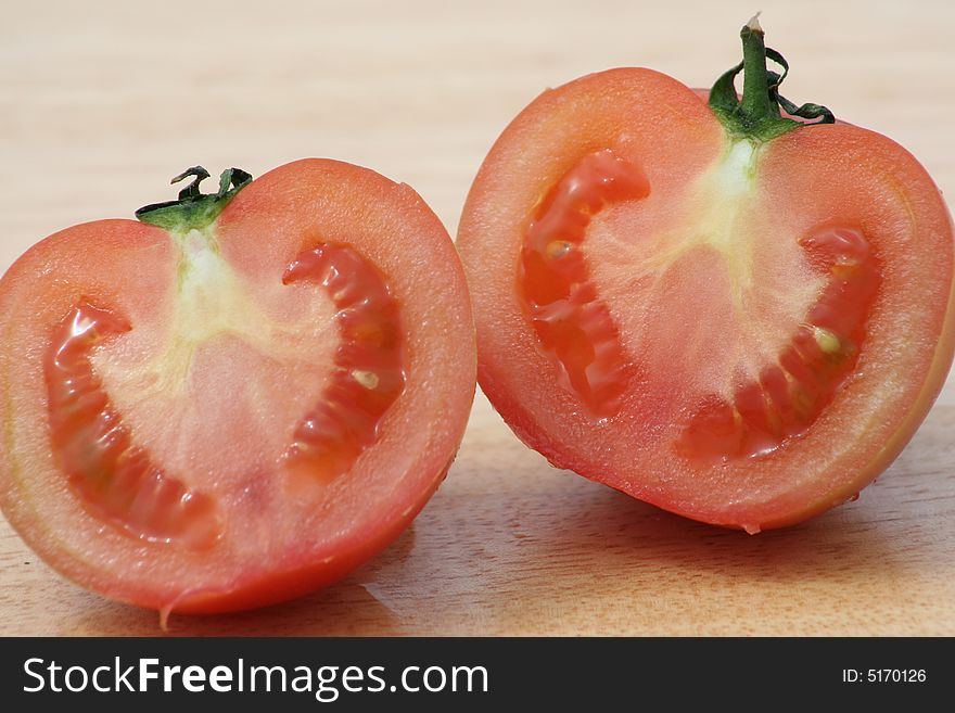 Fresh tomato in half for salad. Fresh tomato in half for salad