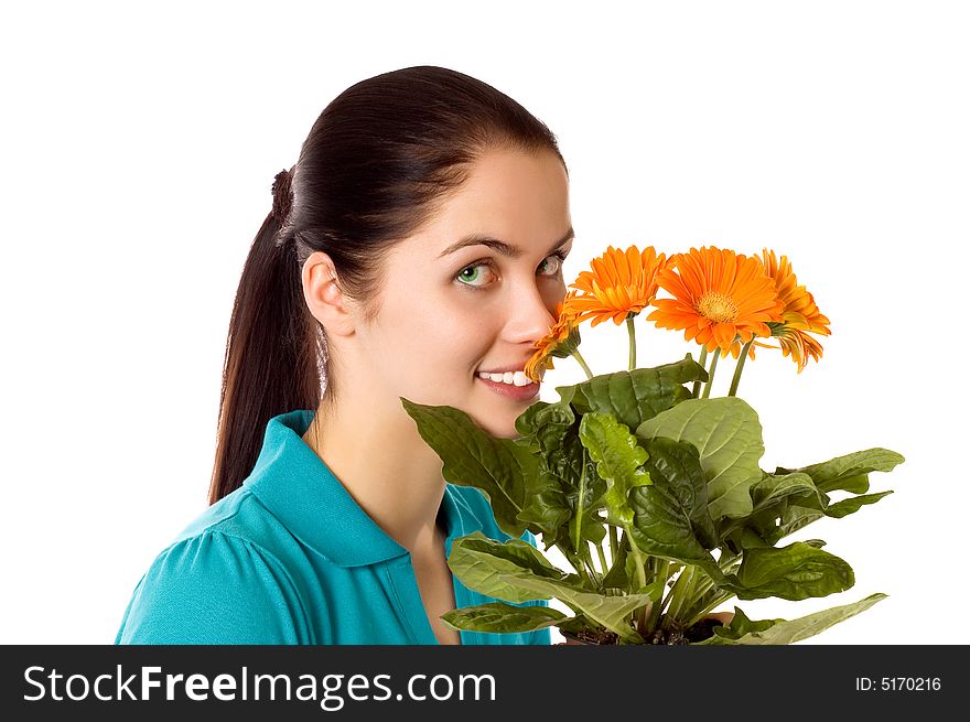 Young smiling woman with gerber flowers