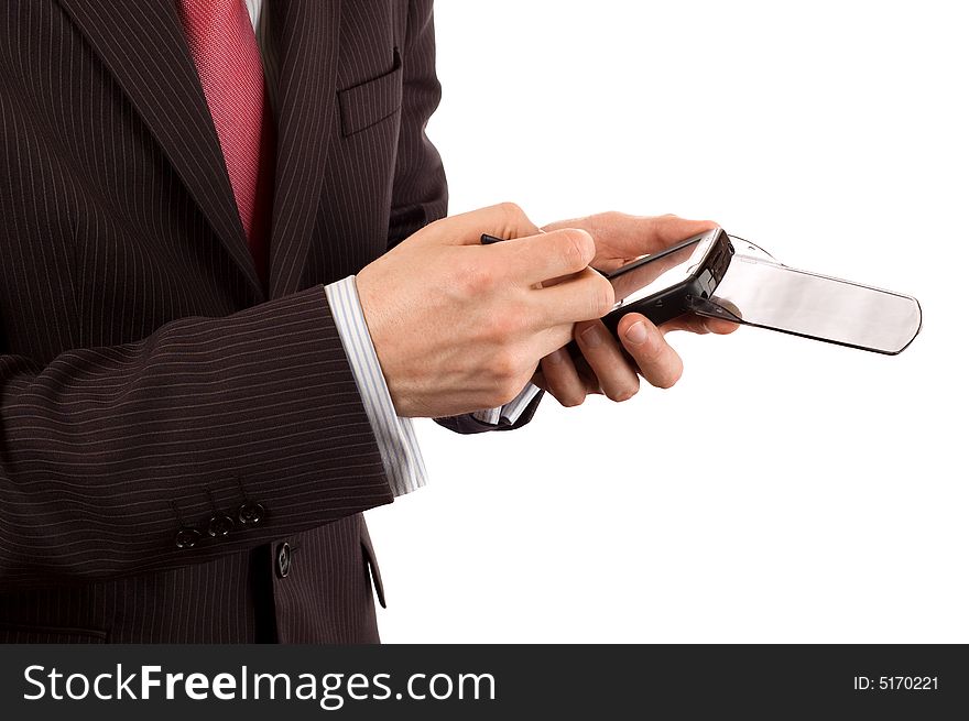 Close-up detail of the hands of a businessman tapping on a pda computer (isolated on white)