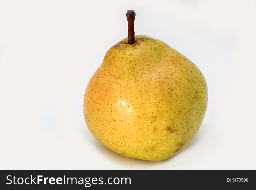 Mature juicy green pear on a white background.