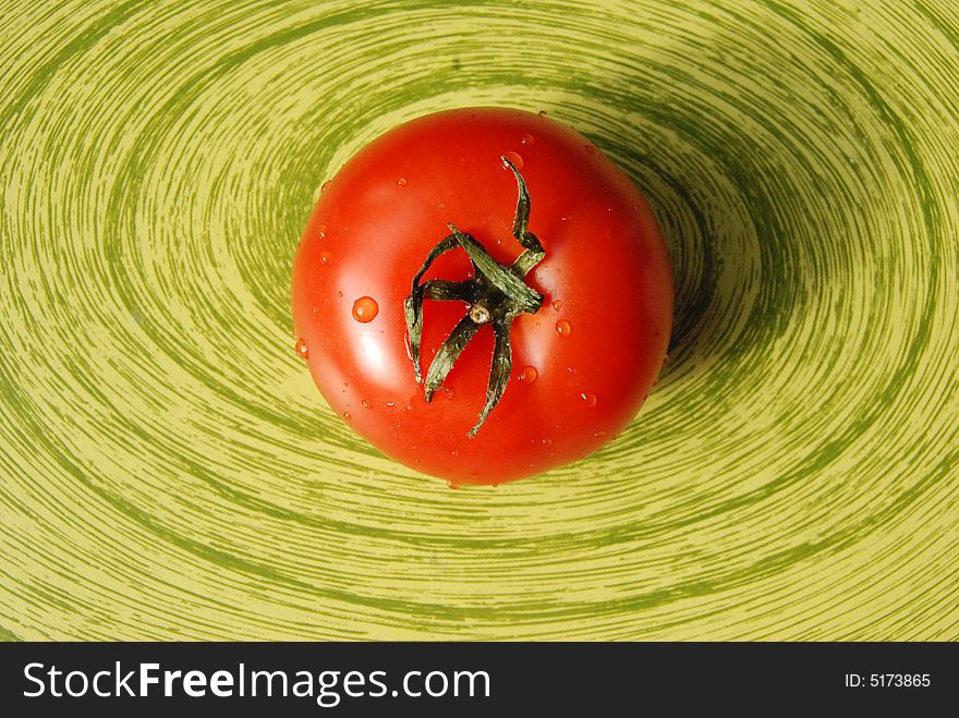 Brightly Tomato on the board. Brightly Tomato on the board