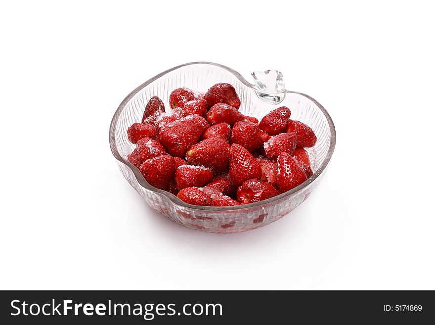 Fresh strawberries with sugar on top isolated on white background