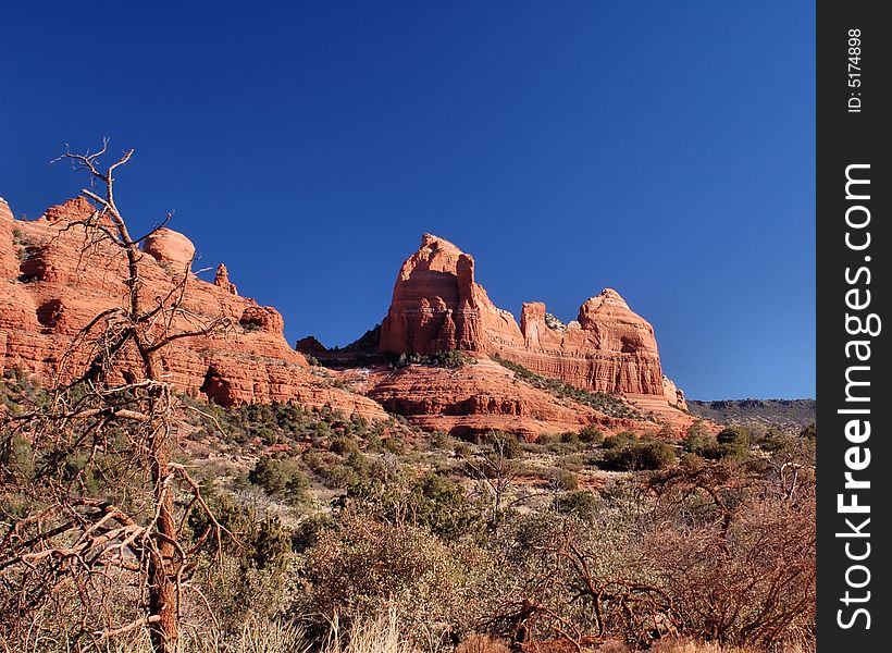 Looking West while driving North along Schnebly Hill Road, you're rewarded with yet another view of the beautiful red rock formations of Sedona. Looking West while driving North along Schnebly Hill Road, you're rewarded with yet another view of the beautiful red rock formations of Sedona.