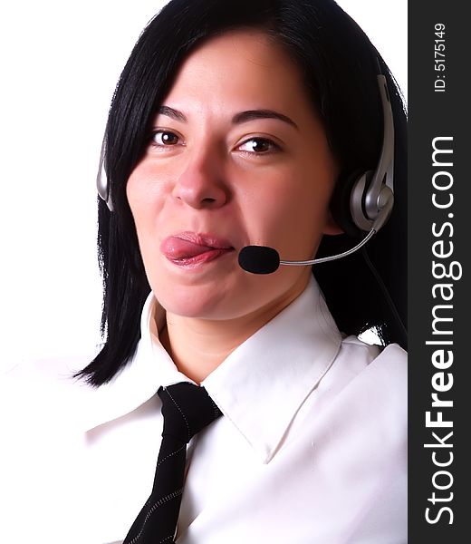 A portrait about a young pretty customer service representative lady with black hair who is smiling, sticking out her tongue, she has a headphone, and she is wearing a white shirt and a black tie. A portrait about a young pretty customer service representative lady with black hair who is smiling, sticking out her tongue, she has a headphone, and she is wearing a white shirt and a black tie