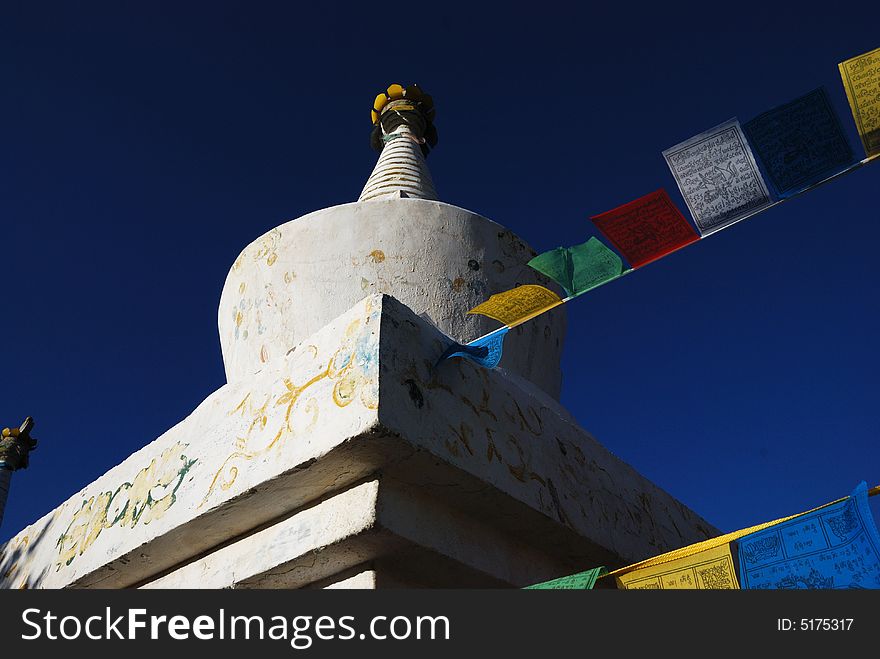 A photo of Tibet buddhism chorten at the foot of Mt.Meili. Which is a holy mountian in Tibet buddhism tales.