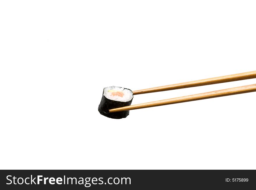 Two chopsticks with roll