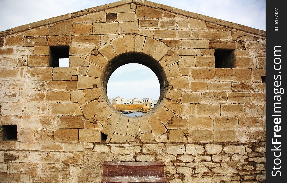 View through the harbour wall Essaouira Morocco