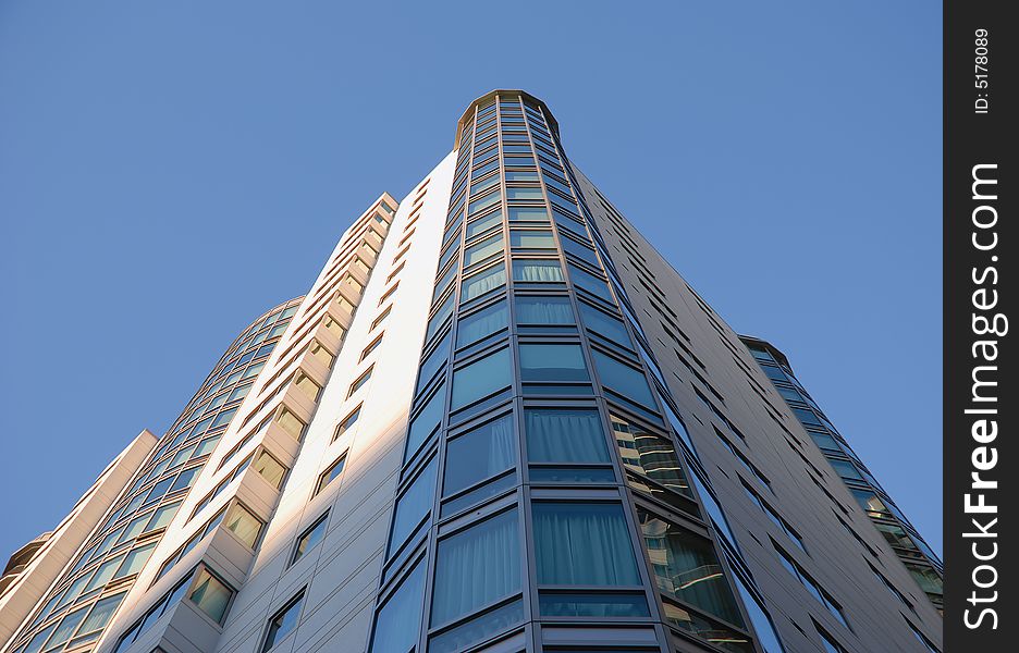 Modern building against blue sky background