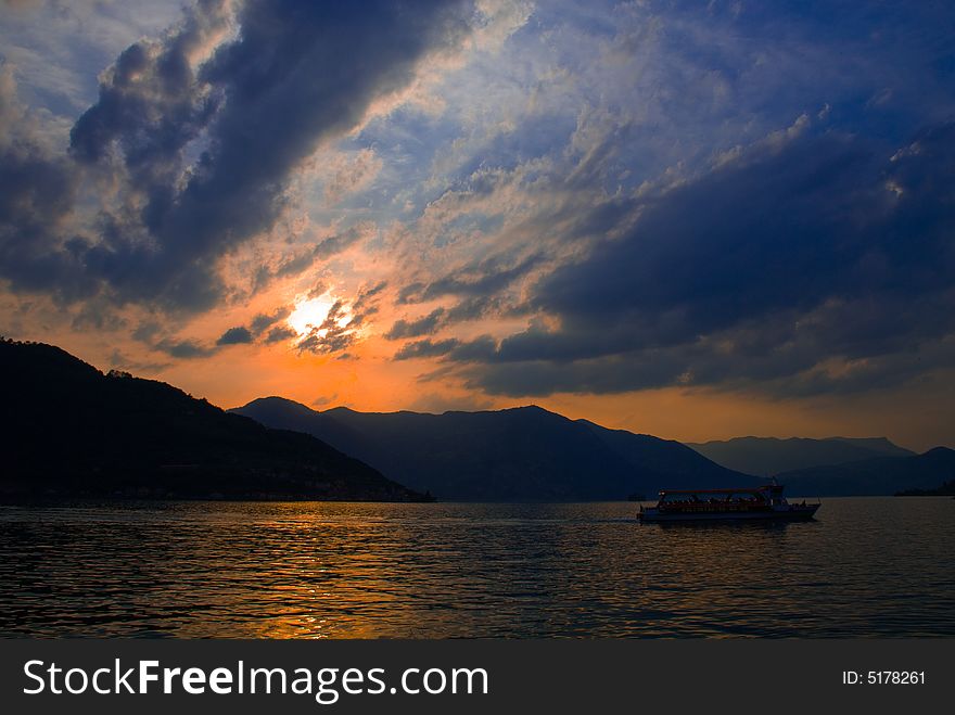 A picturesque view of the Iseo lake in Italy at sunset.