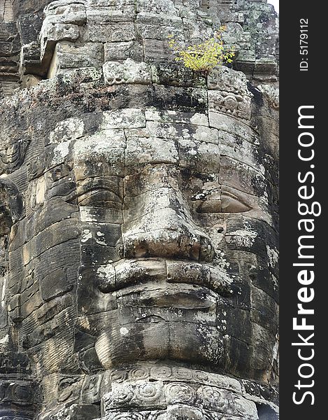 The bayon construction started probably arround 1200 AD during the reign of Jayavarman VII to Jayavarman VIII. Art historians considered that this temple is one of the most enigmatic religious construction in the world. Here view of one face tower in SE part of the upper terrace. The bayon construction started probably arround 1200 AD during the reign of Jayavarman VII to Jayavarman VIII. Art historians considered that this temple is one of the most enigmatic religious construction in the world. Here view of one face tower in SE part of the upper terrace