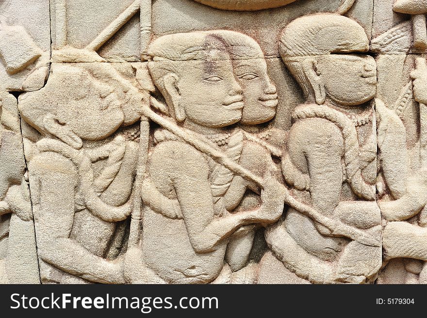 The bayon construction started probably arround 1200 AD during the reign of Jayavarman VII to Jayavarman VIII. Art historians considered that this temple is one of the most enigmatic religious construction in the world. here one example of the bas reliefs on the walls, the two registers of the army on the march, S section E outer gallery, N of the doorway; This is a representation of the infantry. The bayon construction started probably arround 1200 AD during the reign of Jayavarman VII to Jayavarman VIII. Art historians considered that this temple is one of the most enigmatic religious construction in the world. here one example of the bas reliefs on the walls, the two registers of the army on the march, S section E outer gallery, N of the doorway; This is a representation of the infantry