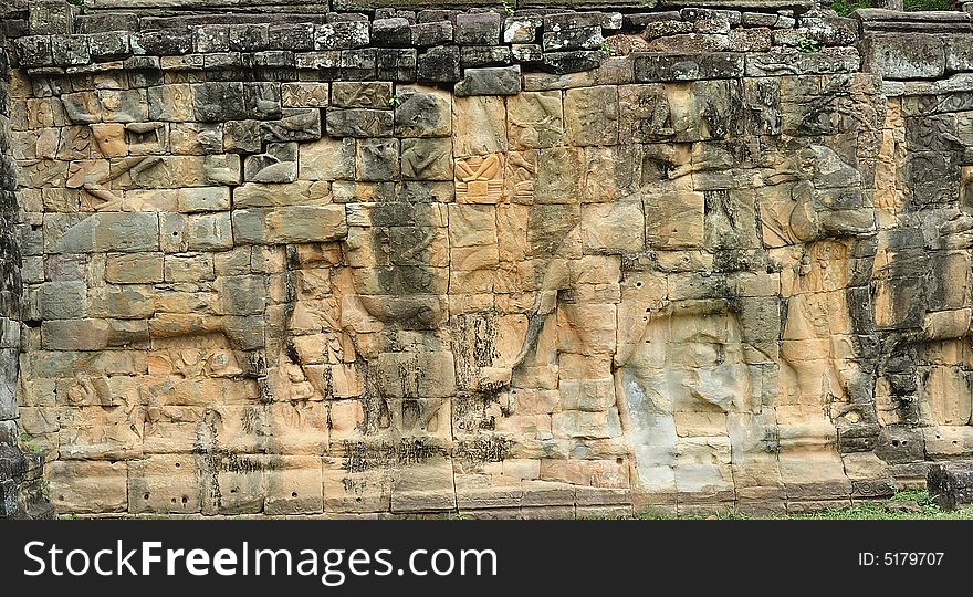 The elephant terrace in the style of bayon date from the 12th century with additions in  late 13th century during the reigns of Jayavarman VII and Jayavarman VIII ; this terrace looking out to the royal square is supported by  300 meters of walls of  foundation; these walls  are carved with elephants, garudas and lion headed figures. The elephant terrace in the style of bayon date from the 12th century with additions in  late 13th century during the reigns of Jayavarman VII and Jayavarman VIII ; this terrace looking out to the royal square is supported by  300 meters of walls of  foundation; these walls  are carved with elephants, garudas and lion headed figures