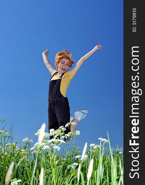 Happy jumping woman on nature. Happy jumping woman on nature