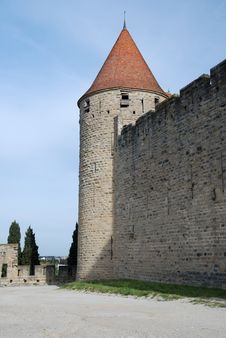 Lofty Tower And Defense Walls Of Castle Stock Photo