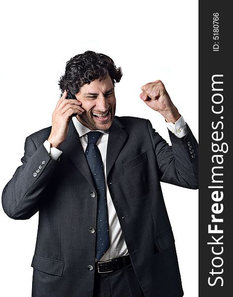 Expression of a successful businessman talking on a mobile phone