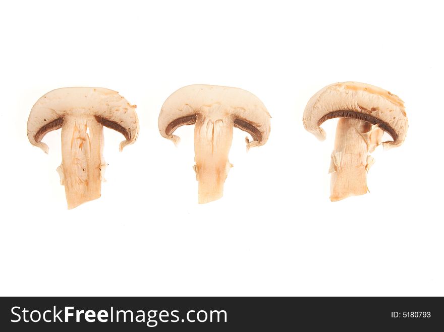 Sections of a mushroom isolated on a white background. Sections of a mushroom isolated on a white background